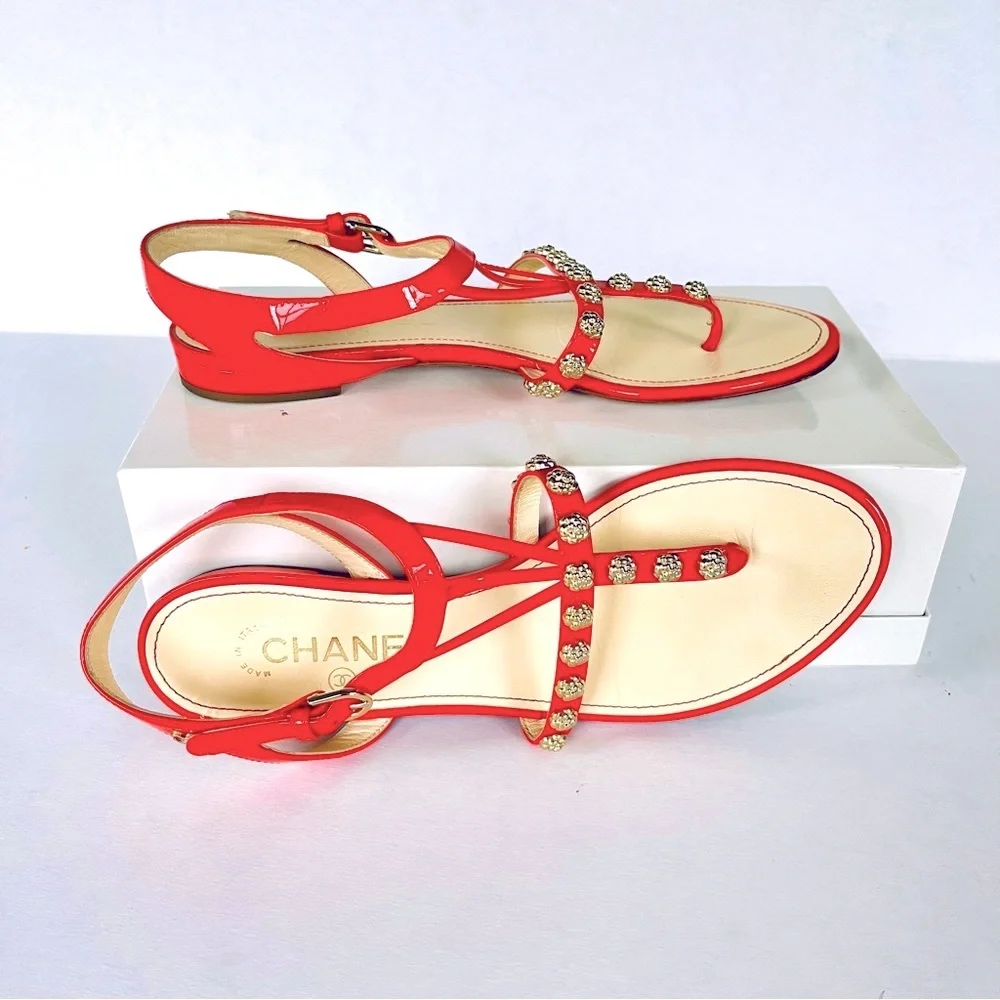CHANEL coral red gold camellia studded flat sandals 38